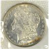 Image 2 : 1882-CC GSA MORGAN DOLLAR (SOFT PACK) MS63 TONED