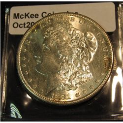 673. 1881 S Morgan Silver Dollar. Brilliant MS 64 Semi-Prooflike.