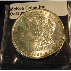 674. 1885 O Morgan Silver Dollar. Brilliant MS 64.