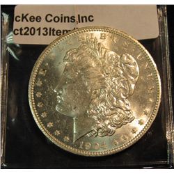 676. 1904 O Morgan Silver Dollar. Brilliant MS 63+.