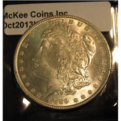 687. 1889 P Morgan Silver Dollar. Brilliant MS 63.