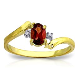 14K Y.GOLD 0.01ctDIAMOND & 0.45ct OVAL GARNET RING