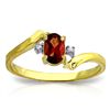 Image 1 : 14K Y.GOLD 0.01ctDIAMOND & 0.45ct OVAL GARNET RING
