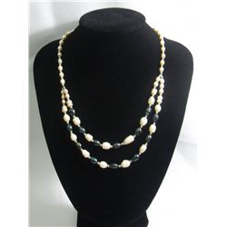 195CTW BLACK AND WHITE DOUBLE STRAND WITH PEACH