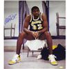 Image 1 : MAGIC JOHNSON SIGNED SITTING ON CHAIR VERTICAL PHOTO
