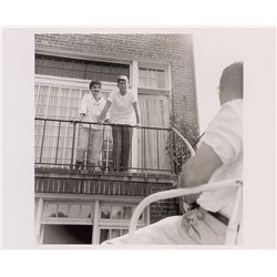 John and Jacqueline Kennedy Photograph Talking from Their Balcony