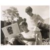 Image 1 : John and Jacqueline Kennedy Photograph Reading the Paper