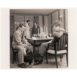 John and Robert Kennedy Photograph Consulting over Dinner