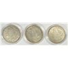 Image 2 : 1921 P,D AND S MORGAN SILVER DOLLAR SET IN  CAPSULES AND VELVET PRESENTATION BOX