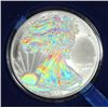 Image 1 : 2009 AMERICAN SILVER EAGLE WITH HOLOGRAPHIC EFFECT, ONE OUNCE .999 SILVER COIN