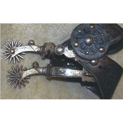 double mounted Calif spurs marked #112