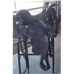 Victor full tooled saddle with silver conchos, horn cap