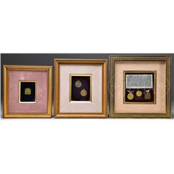 FRAMED LALIQUE MEDALS.