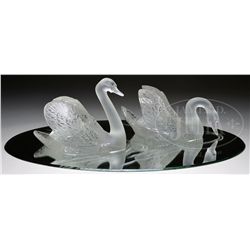 LALIQUE FROSTED SWANS ON MIRROR.