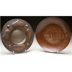 TWO ARTS AND CRAFTS HAMMERED PLATES.