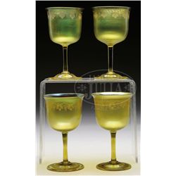 FOUR TIFFANY INTAGLIO CARVED GOBLETS.