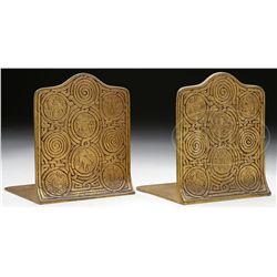 PAIR OF TIFFANY STUDIOS ZODIAC BOOKENDS.