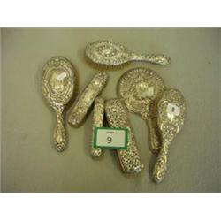 Quantity of hallmarked brushes and mirrors £30 - 50...