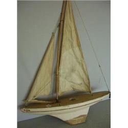 Wooden weighted pond yacht £30 - 50...