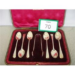 Boxed set of teaspoons and sugar tongs £10 - 20...