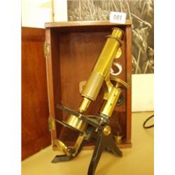 Boxed brass microscope with additional lenses £80 - 120...