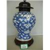 Image 1 : Early 19th century oriental vase with later carved wood top and base in Prunus pattern, 20" high...