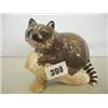 Image 1 : Beswick raccoon on log No. 2194 £60 - 80...