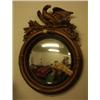 Image 1 : Regency round convex mirror with hand carved eagle and acanthus leaf decoration £200 - 300...