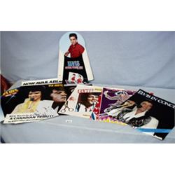 7 MISC. ELVIS POSTERS IN GOOD COND.