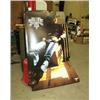 Image 1 : 3 LITE BEER SIGN OF CARDBOARD. CLINT BLACK. SOME CHIPPING AT FOLD. H59.5", L44". WEIGHT 9LBS. 1 L...