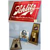 Image 1 : 3 SCHLITZ BEER SIGNS/ONE IS A LIGHT. ALL FAIR COND. TWO ARE H18", W9". LIGHT IS H12", W10.5", D4....