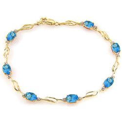 14k Twist Bracelet with Blue Topaz and Diamonds