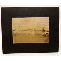 EARLY MOUNTED PHOTO OF GOVERNMENT HORSE STABLES AT FORT LISCUM ALASKA