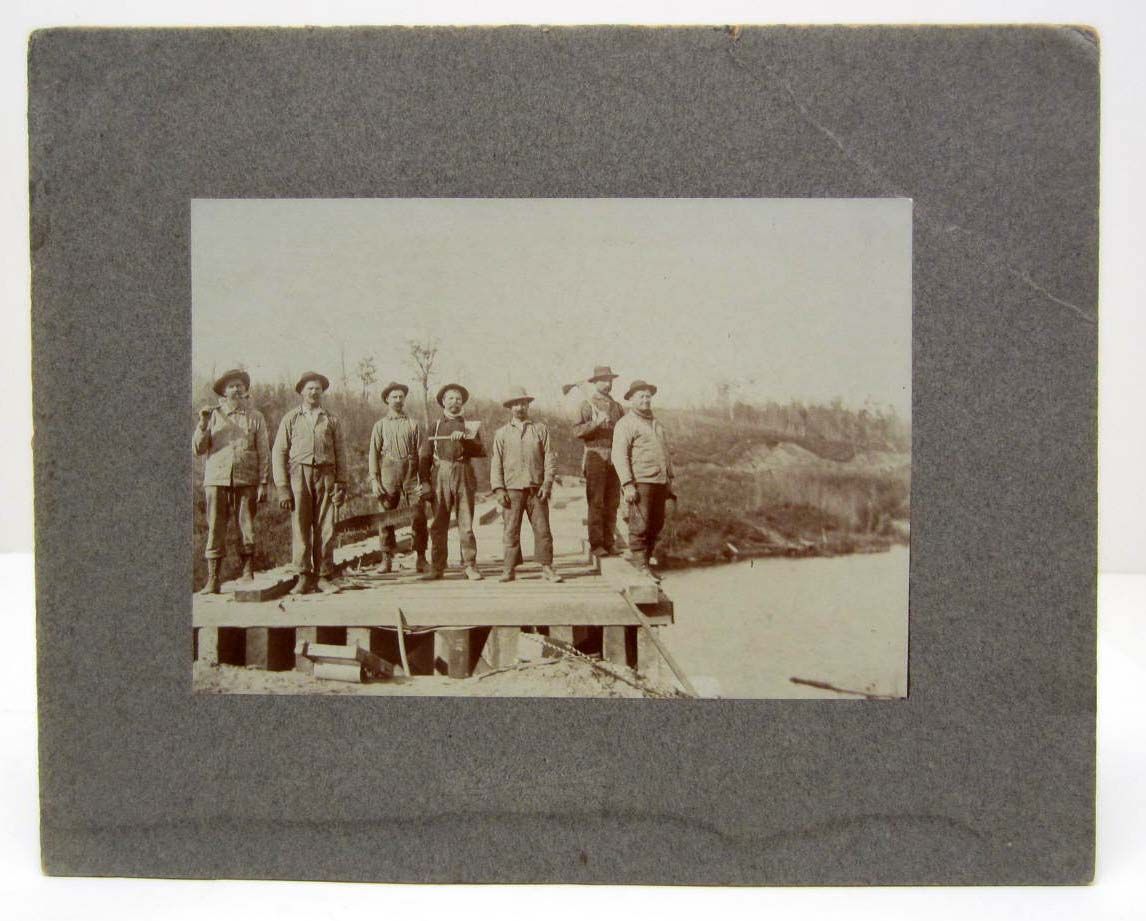 RARE ANTIQUE MOUNTED PHOTO OF BRIDGE BUILDERS POSING ON A PARTIALLY ...