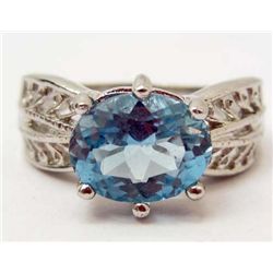 6953 - STERLING SILVER SKY BLUE TOPAZ RING SIZE 8