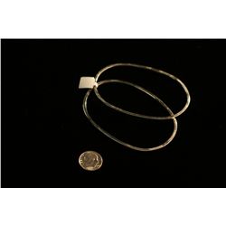 Pair of Sterling Oval Bangles,