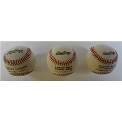 3 unused baseballs.