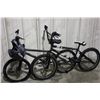 Image 1 : GREY STUNT BIKE WITH HELMET AND BLACK STUNT BIKE