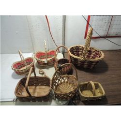 LOT 7 VARIOUS SIZE HOOP HANDLE WOVEN BASKETS