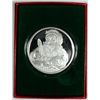 Image 1 : SANTA CLAUSE ON A ONE OUNCE .999 SILVER ART ROUND, COMES IN CAPSULE AND GIFT BOX