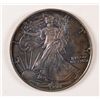 Image 1 : 1990 AMERICAN SILVER EAGLE ONE OUNCE .999 SILVER COIN, MS-69  HEAVY TONING
