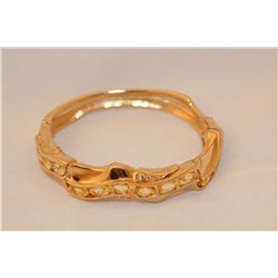 14KT YELLOW GOLD NATURAL GOLDEN YELLOW SAPPHIRES AND DIAMOND BANGLE STYLE BRACELET. THE BRACELET IS