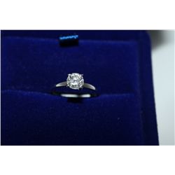 ONE LADIES WHITE GOLD FOUR CLAW DIAMOND RING, STAMPED 14KT. SET WITH ONE (1) ROUND BRILLIANT CUT