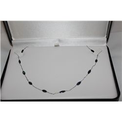 STAMPED 14KT WHITE GOLD SAPPHIRE NECKLACE. SAPPHIRE: 6.00 CARAT ITEM WEIGHT: 2.63 GRAMS
