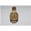 Image 1 : ONE LADY'S OMEGA 18KT YELLOW GOLD DIAMOND SET WRIST WATCH. THE WATCH HAS A SQUARE SHAPED CASE OF 22