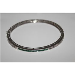 STERLING SILVER EMERALD DIAMOND BRACELET. STAMPED 925 SILVER, INCLUDES APPROX. 2.40 CT GEMSTONE