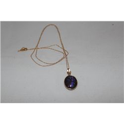 14K YELLOW GOLD AMMOLITE PENDANT NECKLACE. NATURAL AMMOLITE: 5.00 CARAT CUT: MODIFIED OVAL