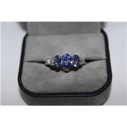 STERLING SILVER TANZANITE AND DIAMOND RING. NATURAL TANZANITE 1.04 CARAT ACCOMPANIED BY DIAMOND