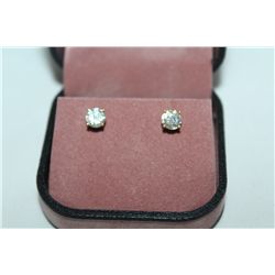 ONE PAIR OF YELLOW GOLD FOUR CLAW DIAMOND STUD EARRINGS, STAMPED 14KT, SET WITH TWO (2) ROUND