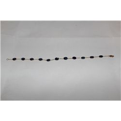 ONE LADIES 14KT YELLOW GOLD HAND MADE BEZEL SET AND OPEN LINK COMBINATION, BLUE SAPPHIRE BRACELET.